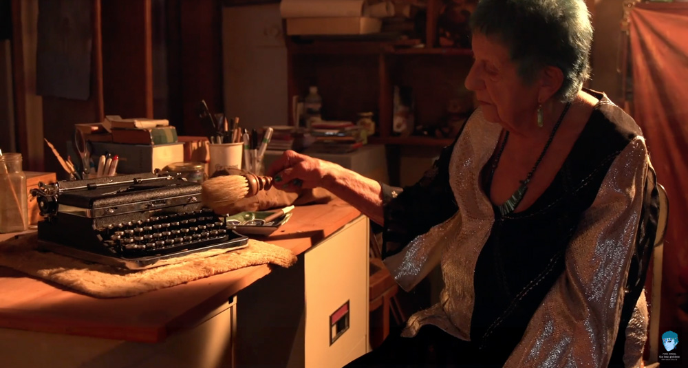 ruth weiss at home with typewriter by Melody C. Miller