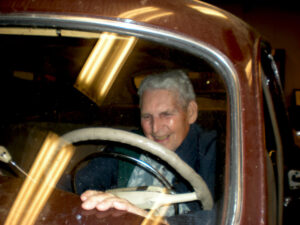 Al Hinkle takes a nostalgic moment at the wheel